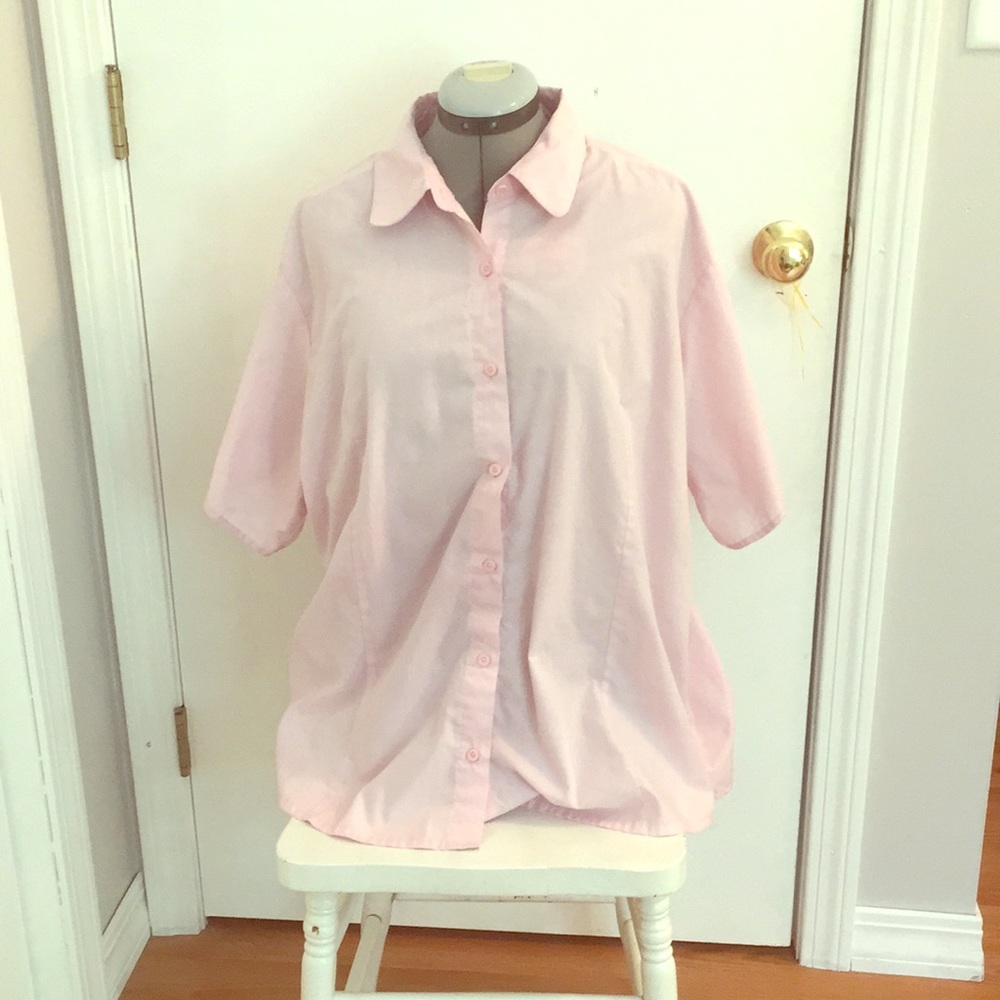 Woman’s plus size pink button down